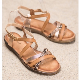 Small Swan Stilvolle braune Sandalen golden 1