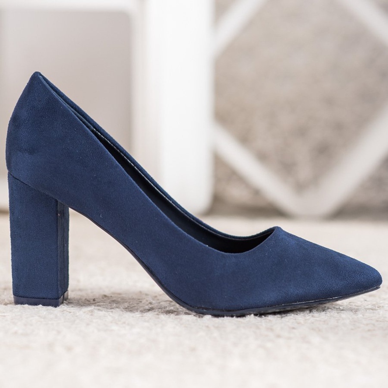 Small Swan Marineblaue Pumps auf einer Säule 1