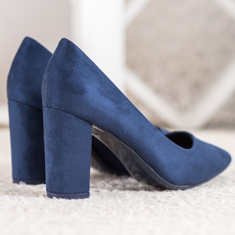 Small Swan Marineblaue Pumps auf einer Säule 2