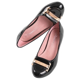 Schwarz lackierte Pumps an der Säule 0080-1 1