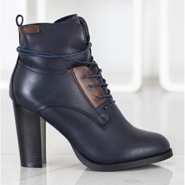 Evento Marineblaue Stiefel auf einer Säule 2