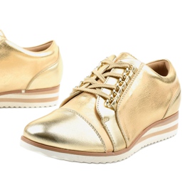 Goldene Sneakers mit Keilabsatz 15S8621 1