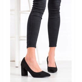 Renda Schwarze Pumps auf einer Säule 2