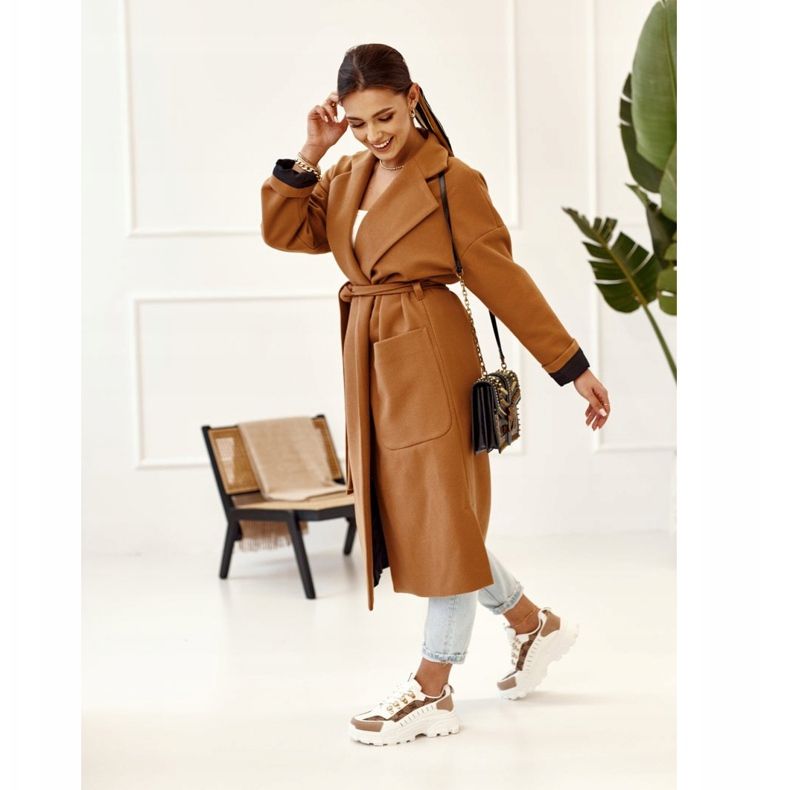 Damen-Sneaker auf einem massiven weißen Daydreamer beige braun golden 2