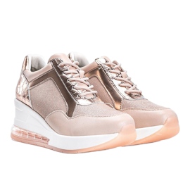 Rotgoldene Sneaker auf dem Jimena Wedge rosa 1