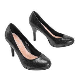 Schwarz glänzende Pumps auf der Arely-Plattform 1