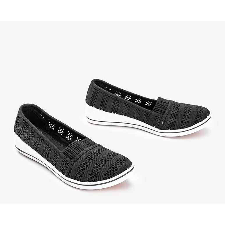 Schwarze Slip On Sneakers auf dem SoHo Wedge 1