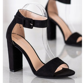 Goodin Schwarze Sandalen auf einem hohen Pfosten 1