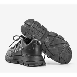 Schwarze Sneaker mit reflektierenden Filua-Einsätzen 1