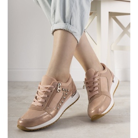 Rosa Sport-Sneakers verziert mit Daphne-Nieten 1