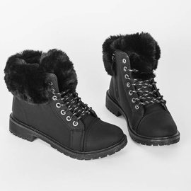 Schwarze, isolierte Stiefel von Sia 1