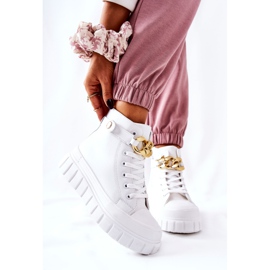 Hohe Sneakers auf der weißen Standies-Plattform golden 2