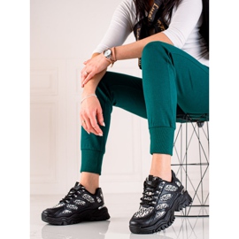 TRENDI Schwarze Turnschuhe auf der Plattform 1