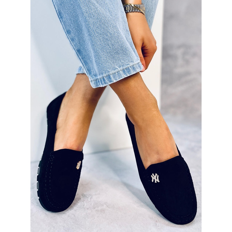 Schwarze Sekue-Slipper für Damen 1