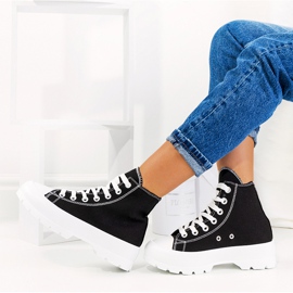 Schwarze Sneakers auf hoher Berrios-Sohle 1