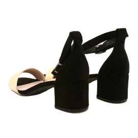 Schwarze und goldene Sandalen auf einer Bar Evento 20SD98-1618 4