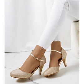 BM Goldglänzende Pumps von Rosetown golden 1