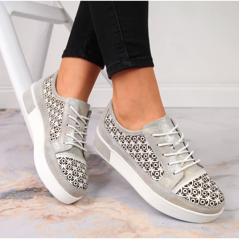 Damenschuhe aus goldfarbenem durchbrochenem Leder Filippo 1