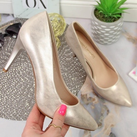 Pumps auf einem goldenen Stiletto von Sergio Leone 1