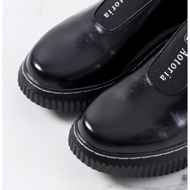 Schwarze Brogues auf der Siddons-Plattform 1