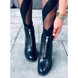 Gewellte schwarze hochhackige Stiefel 1