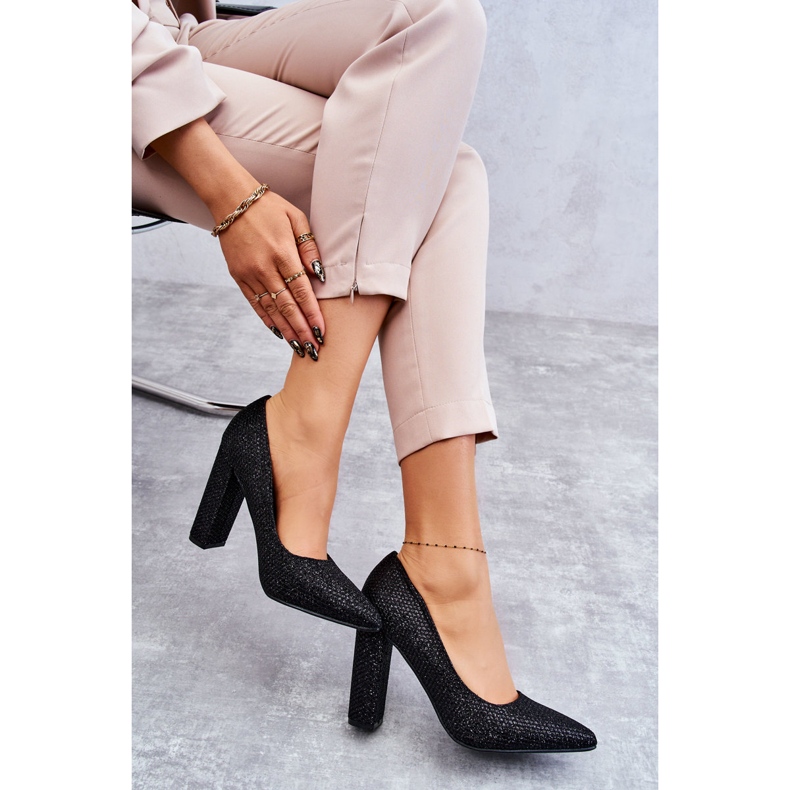 Glänzende Pumps auf schwarzem Absatz 4