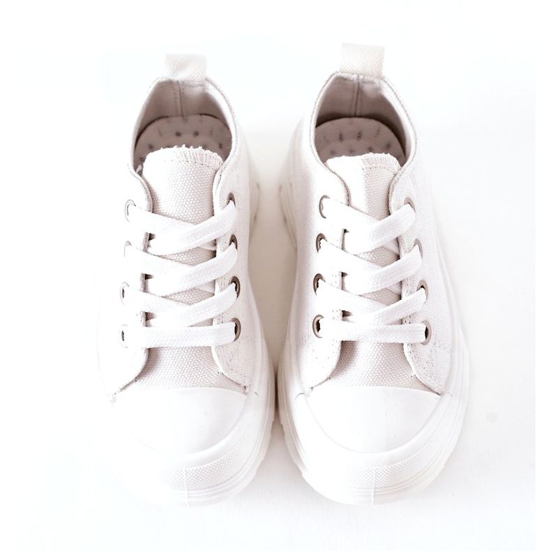 Kindersneaker auf der weißen Plattform 3