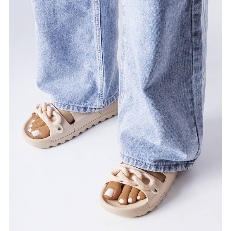 Beigefarbene Étoile-Gummipantoletten 1