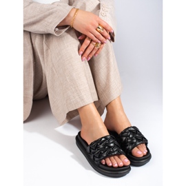 Schwarze Pantoffeln auf einem dicken Shelovet-Plateau 1