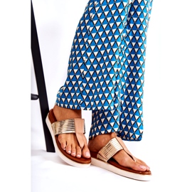 Frauenflip-Flops auf beige-Gold-Plattform 1