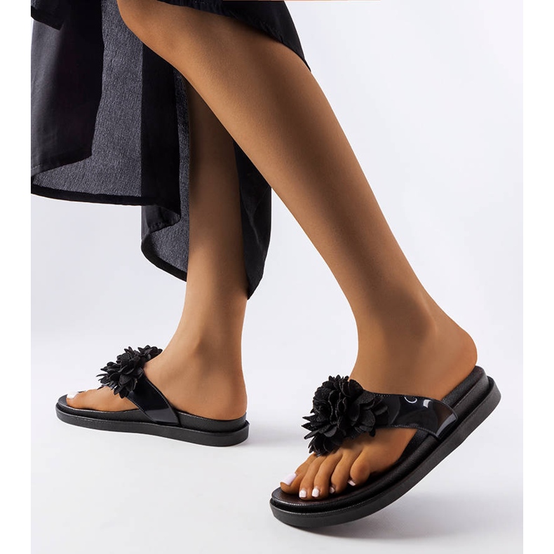 Schwarze Flip-Flops, verziert mit Caresse-Blumen 1