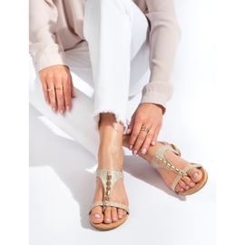 Goldene flache Shelovet-Sandalen 1